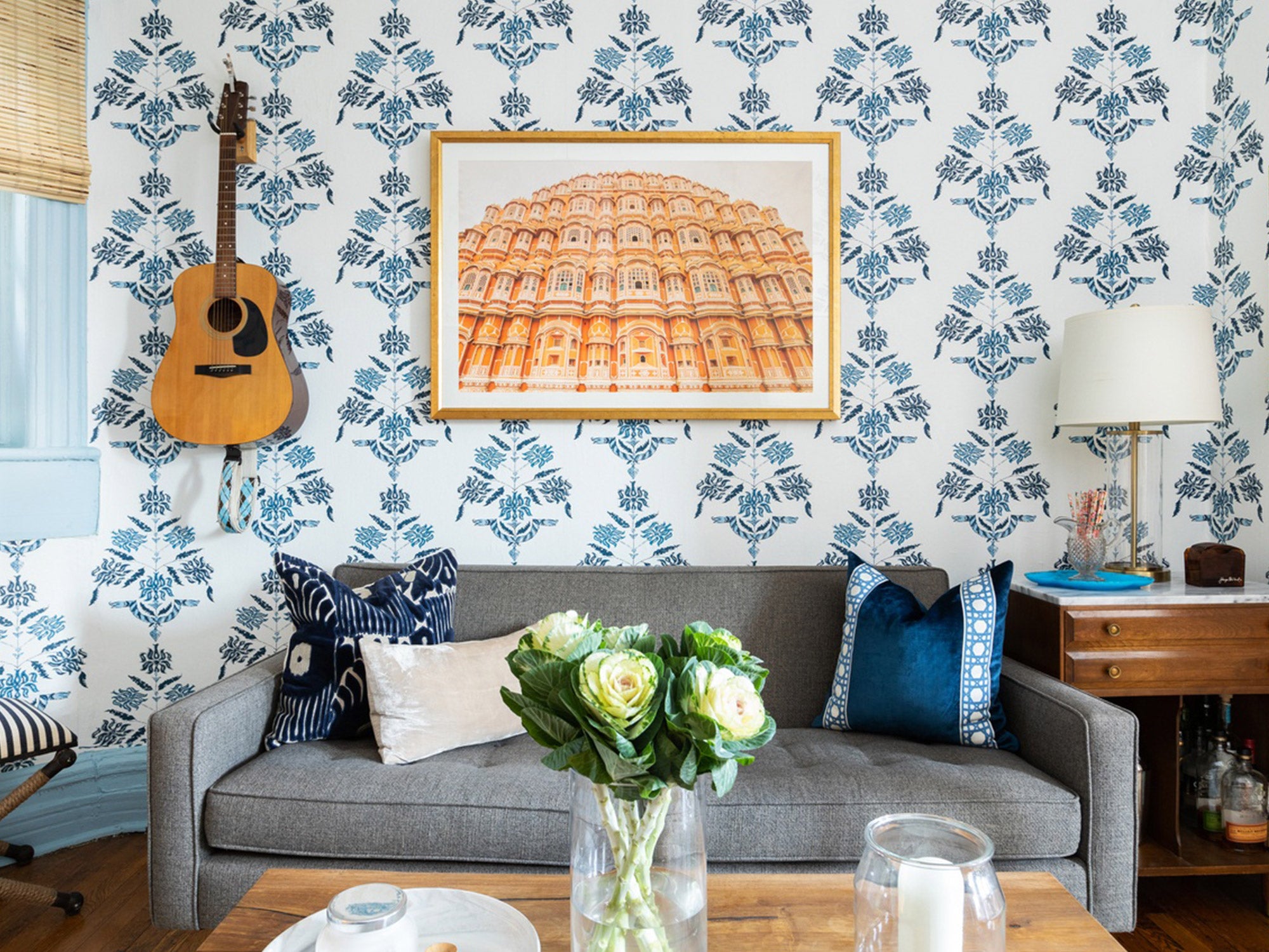 Mix Patterns Like a Pro With These Tips From 3 of Our Favorite Interior Designers | Living room by Megan Hopp featuring Soldo Navy wallpaper by Tilton Fenwick for Hygge & West