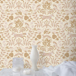 Piedmont (Blush) wallpaper with pink foxes, taupe flora, white accents on a light pink background