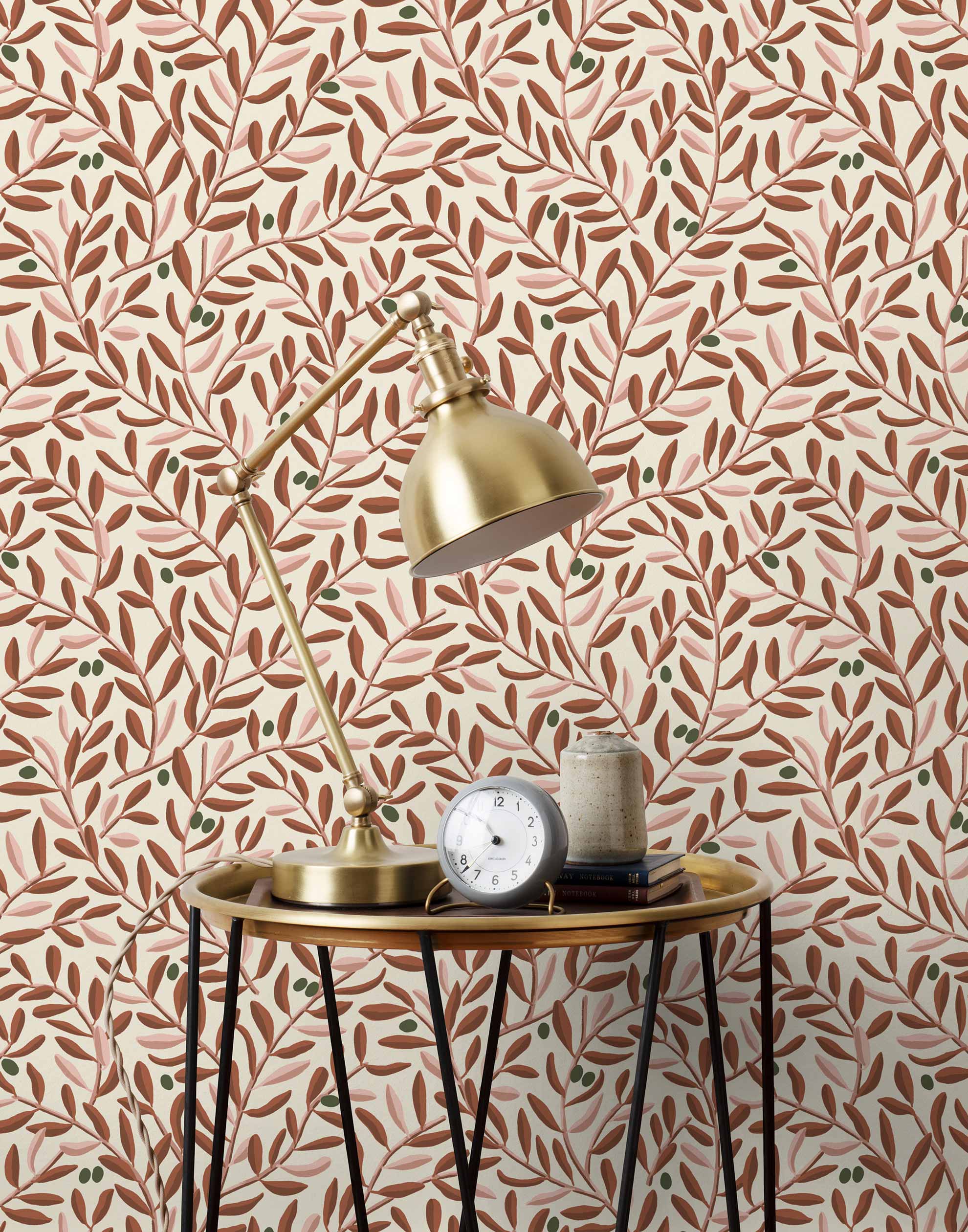 Olive Grove (Bellini) featuring a leafy vine motif in shades of rust and pink with green accents on an off white background | Schoolhouse x Hygge & West Wallpaper Collection