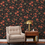 Cascade Meadow (Ebony) featuring hand drawn flowers in red and gold on a black background | Schoolhouse x Hygge & West