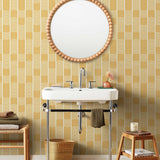 Wallpaper with undulating mustard yellow lines that form rhythmic columns on a white background | Schoolhouse + Hygge & West