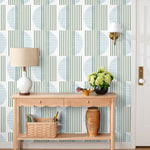 Wallpaper with irregular line work that weaves green rectangles and blue semicircles on a white background | Schoolhouse + Hygge & West
