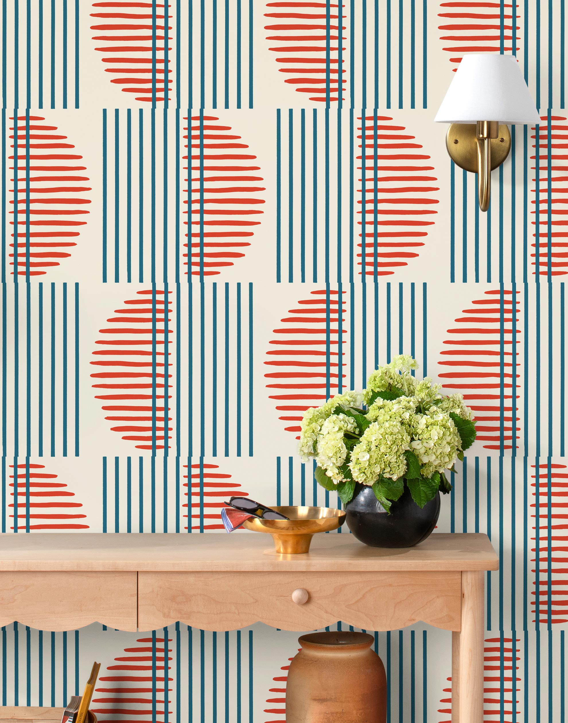 Wallpaper with irregular line work that weaves blue rectangles and red semicircles on an off white background | Schoolhouse + Hygge & West