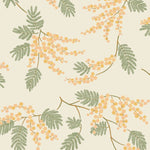 Wallpaper with coral and pink acacia flowers and green leaves on a cream background | Schoolhouse + Hygge & West