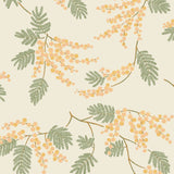 Wallpaper with coral and pink acacia flowers and green leaves on a cream background | Schoolhouse + Hygge & West