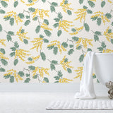 Wallpaper with yellow acacia flowers and green leaves on a white background | Before and after