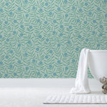Bloom Wallpaper featuring dots and stems in a modern, graphic floral. Before and after.