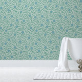 Bloom Wallpaper featuring dots and stems in a modern, graphic floral. Before and after.