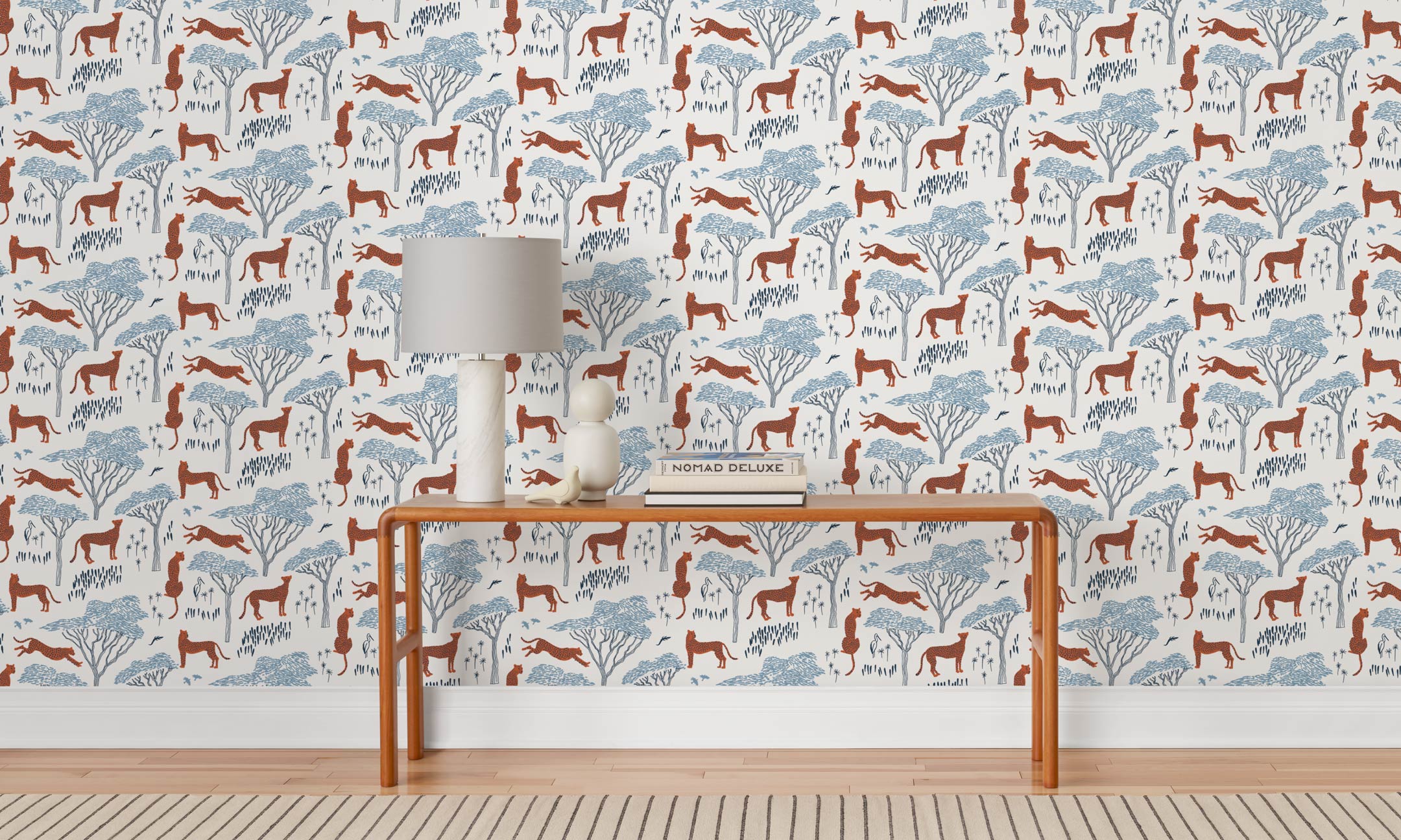 Our Serengeti wallpaper features  cheetahs and birds scattered among acacia trees, reflecting the powerful beauty of the vast plains. Designed by Julia Rothman and made in the USA. Before and after.