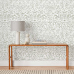 Storyline (Sage) Wallpaper | Folk art inspired pattern featuring flora and fauna. Before and after.