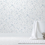 Willows Wallpaper features leaves swaying, chickens pecking, fisherman fishing, children playing, and mothers mothering as they dance beneath the swaying willows. Painted by hand in shades of blue on a white background. Before and after.