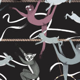 Balancing Act (Ebony) wallpaper features colorful dancing monkeys and rabbits on a black background