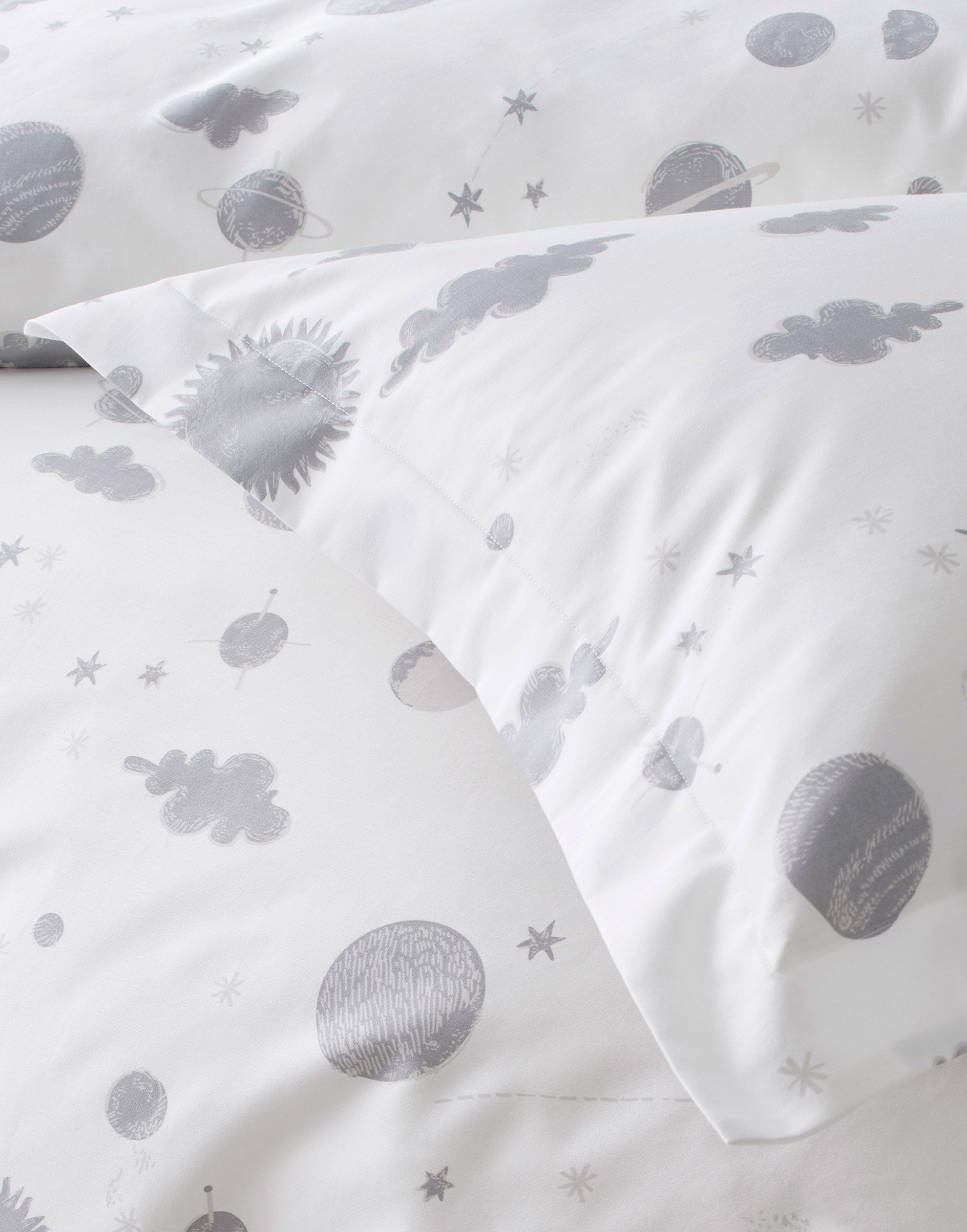 Orbit (Gray) Twin Duvet Set features gray moons, clouds and stars on a soft white background