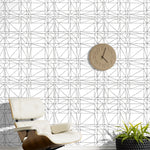 Strike (Charcoal) features modern, geometric metallic gray lines on white