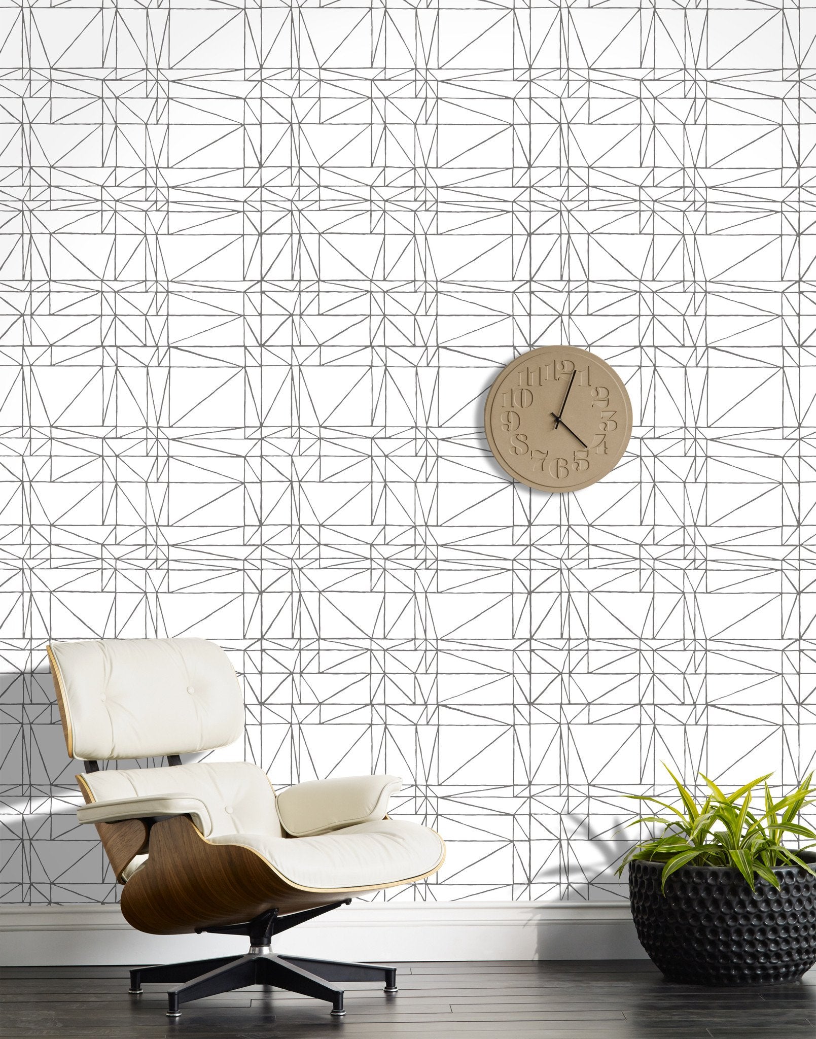 Strike (Charcoal) features modern, geometric metallic gray lines on white