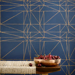 Strike (Navy) features modern, geometric metallic gold lines on navy blue