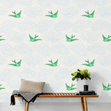 Daydream (Green) features a pattern of flying birds and floating clouds in green and blue white