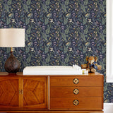 Secret Garden (Amethyst) wallpaper features shades of green, brown, purple, and pink plants, birds and butterflies on dark purple background