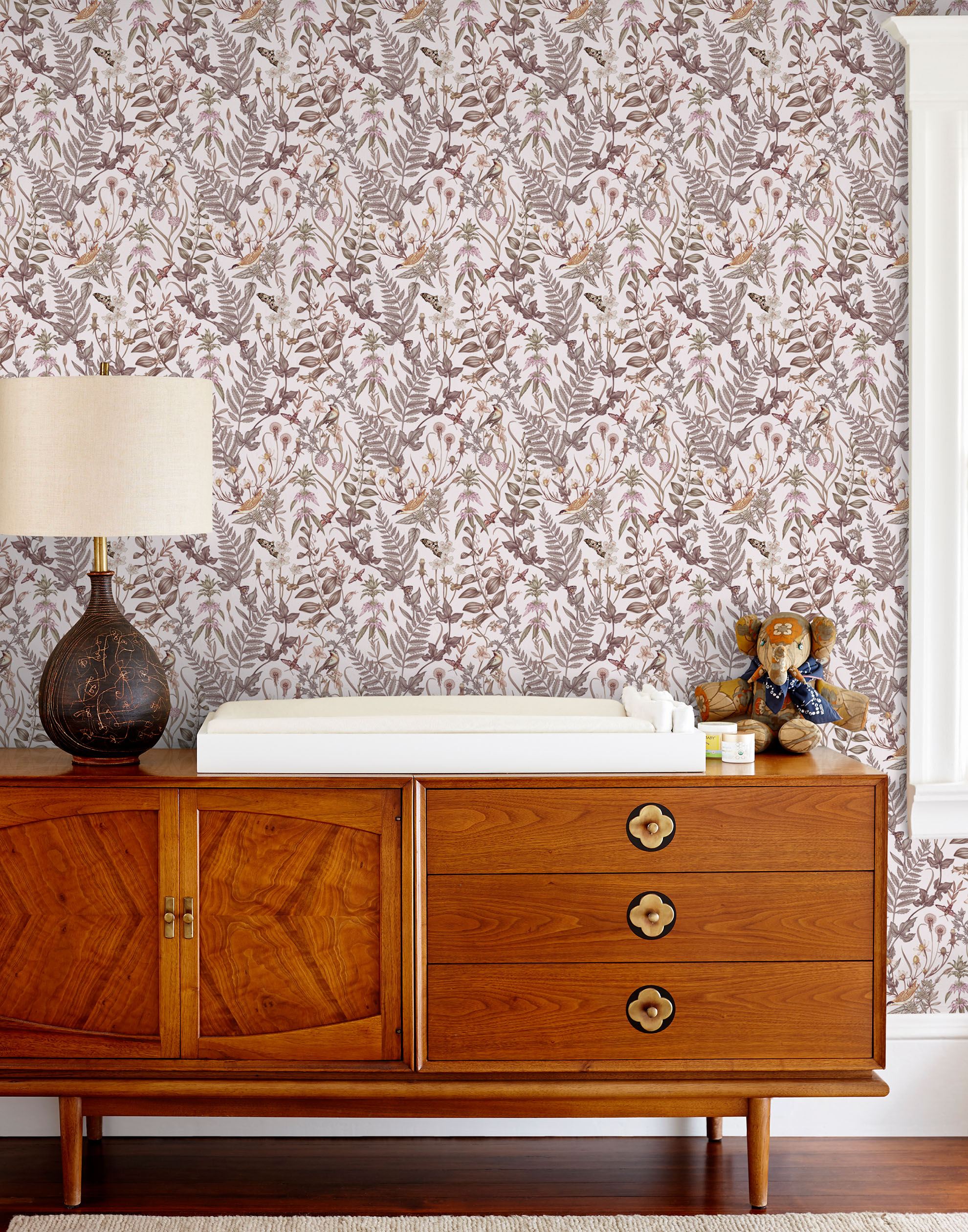Secret Garden (Blush) wallpaper features shades of mauve, brown and taupe plants, birds and butterflies on blush pink background