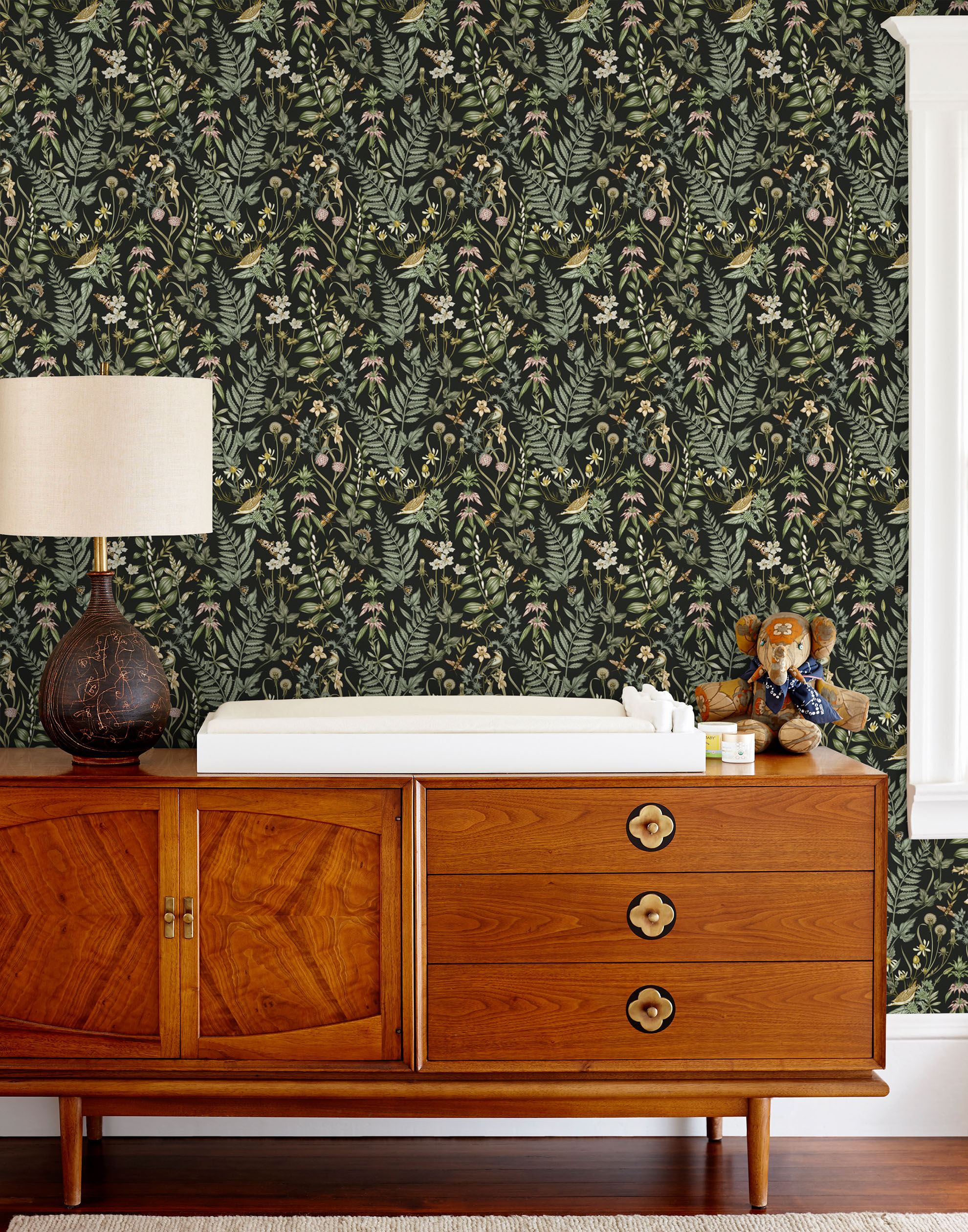 Secret Garden (Ebony) wallpaper features shades of green, pink and taupe plants, birds and butterflies on black background