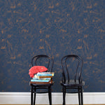Underwater World (Deep Blue) features a yet delicate pattern of fish and seaweed in metallic copper on blue