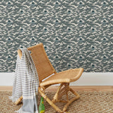 Amity Sunset (Ink) Wallpaper with dark blue and off white illustrations depicts scenes from the iconic movie Jaws and was created in collaboration with Universal | Hygge & West