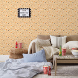 Amity Sunset (Blush) Wallpaper with pink, orange, and white illustrations depicts scenes from the iconic movie Jaws and was created in collaboration with Universal | Hygge & West