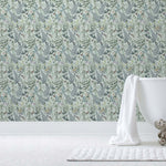 Secret Garden (Robin Egg) wallpaper features shades of green, blue and brown plants, birds and butterflies on a robin egg blue background
